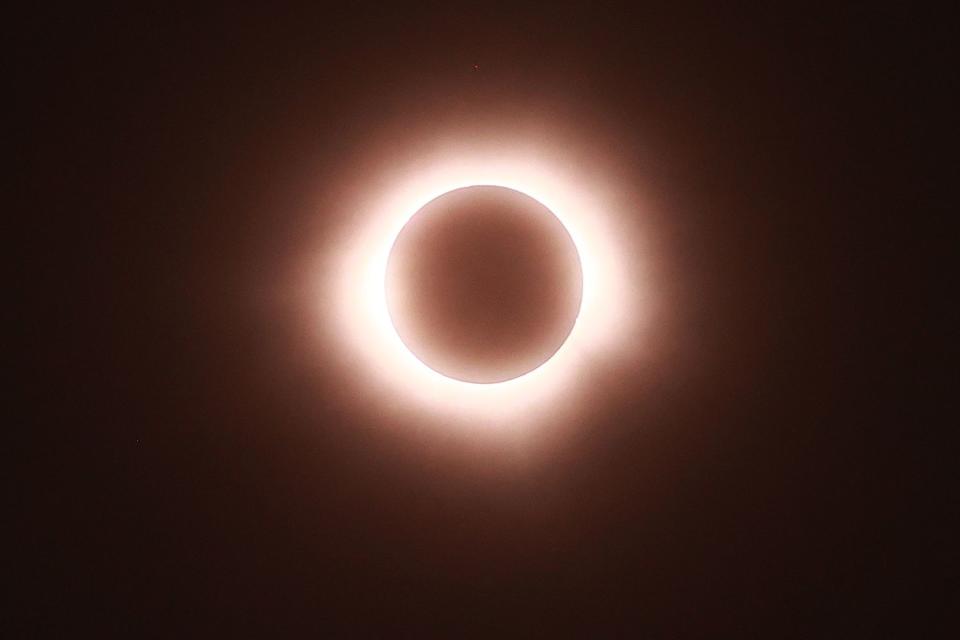 <p>Hector Vivas/Getty</p> The sun disappears behind the moon during the Great North American Eclipse on April 08, 2024 in Mazatlan, Mexico. 