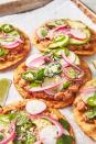 <p>Tostada shells can be tricky to find, so we made our own! Hot and fresh, there's so much more flavor. All that said, these insanely creamy <a href="https://www.delish.com/cooking/recipe-ideas/g41428477/bean-recipes/" rel="nofollow noopener" target="_blank" data-ylk="slk:beans;elm:context_link;itc:0;sec:content-canvas" class="link ">beans</a> + quick <a href="https://www.delish.com/cooking/recipe-ideas/a27245453/pickled-red-onions-recipe/" rel="nofollow noopener" target="_blank" data-ylk="slk:pickled red onions;elm:context_link;itc:0;sec:content-canvas" class="link ">pickled red onions</a> would taste amazing on anything, including a packaged tostada shell. 😉</p><p>Get the <strong><a href="https://www.delish.com/cooking/recipe-ideas/a27168236/tostada-recipe/" rel="nofollow noopener" target="_blank" data-ylk="slk:Best-Ever Mexican Tostadas recipe;elm:context_link;itc:0;sec:content-canvas" class="link ">Best-Ever Mexican Tostadas recipe</a></strong>.</p>