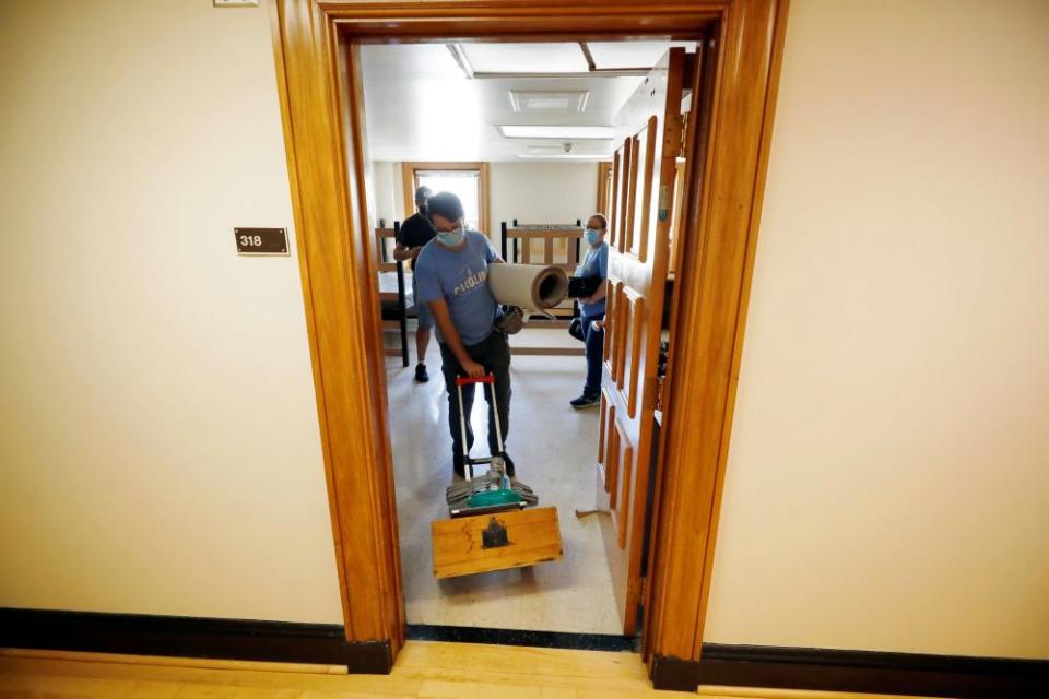 A student moves out of campus housing at the University of North Carolina after an outbreak of Covid-19.