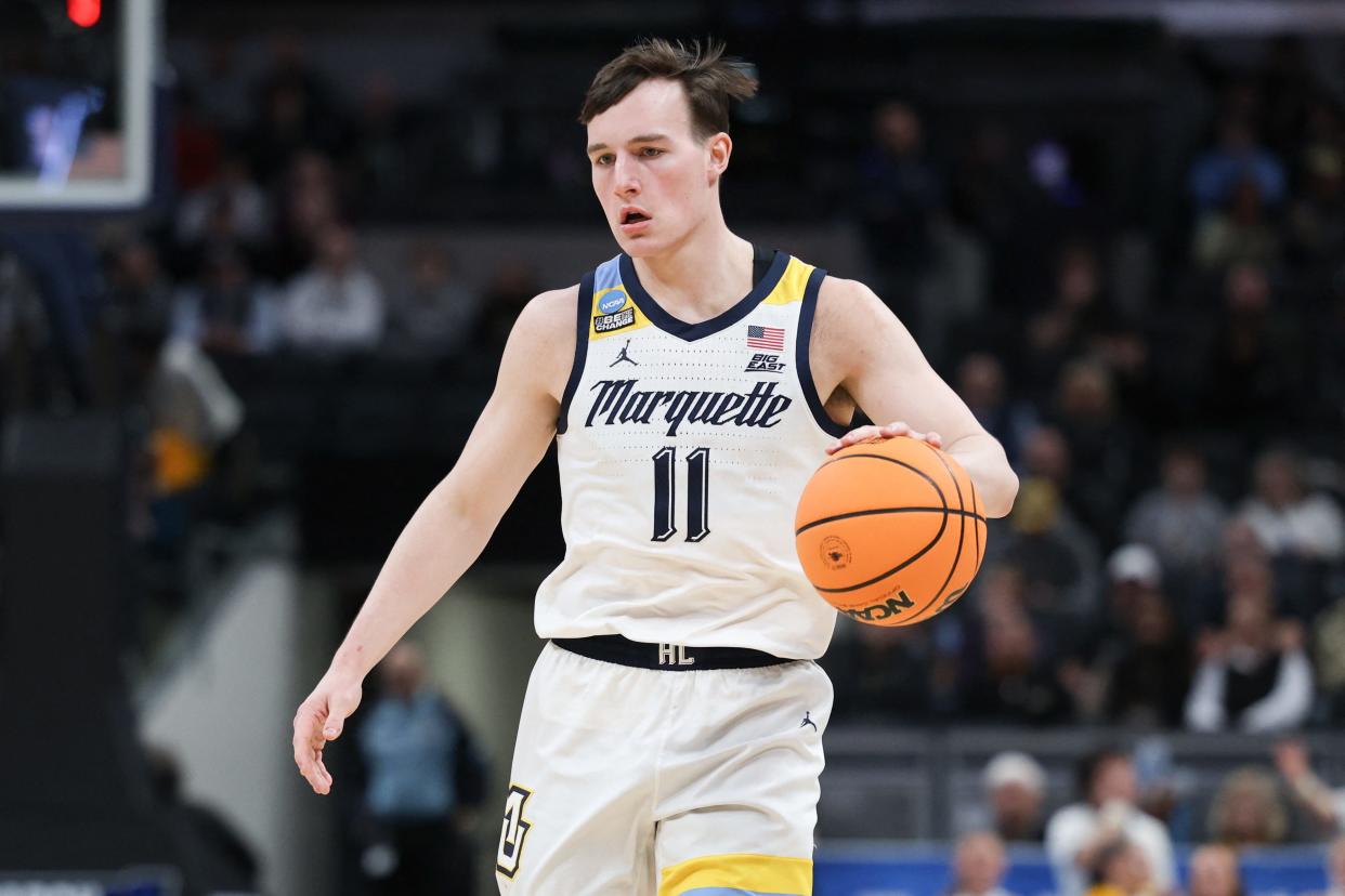 Marquette guard Tyler Kolek handles the ball in the NCAA Tournament game against Colorado on Sunday.