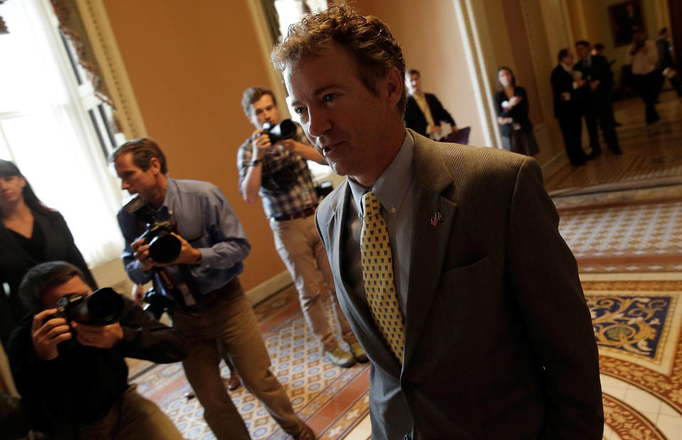 WASHINGTON, DC - OCTOBER 16:  Sen. Rand Paul (R-KY) arrives for a meeting of Senate Republicans on a solution for the pending budget and debt limit impasse at the U.S. Capitol October 16, 2013 in Washington, DC. The U.S. government shutdown is in its sixteenth day as the U.S. Senate and House of Representatives remain gridlocked on funding the federal government and the extending the nation's debt limit.  (Photo by Win McNamee/Getty Images)