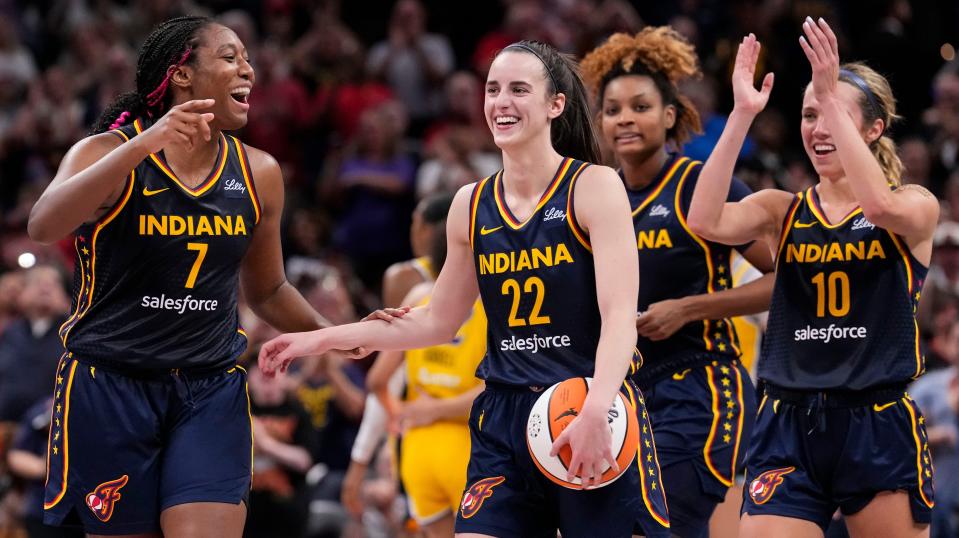 Indiana Fever forward Aliyah Boston (7) celebrates with Indiana Fever guard Caitlin Clark (22) altering recording a triple-double Wednesday, Sept. 4, 2024, during the game at Gainbridge Fieldhouse in Indianapolis. The Indiana Fever defeated the Los Angeles Sparks, 93-86. (Photo by Grace Hollars/USA TODAY Network)