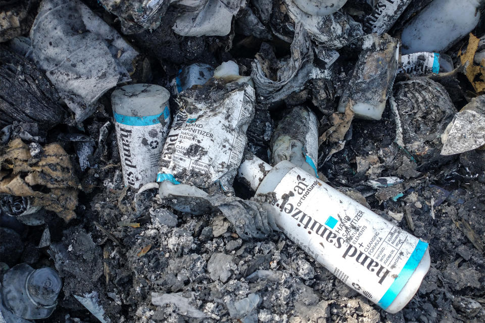 A charred bottle of Artnaturals hand sanitizer by the company's warehouse. (Amy Martyn)