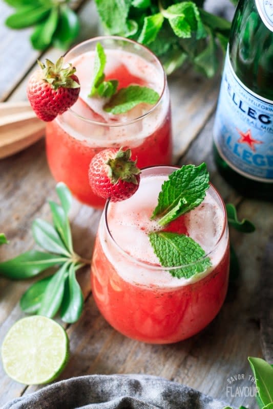 <p>Savor the Flavor</p><p>This non-alcoholic spritzer will taste sweet, fruity and bubbly with hints of sour lime juice and fresh mint. The drink is cold from the ice and slightly foamy from the pureed strawberries.</p><p><strong>Get the recipe: <a href="https://savortheflavour.com/strawberry-mint-spritzer/" rel="nofollow noopener" target="_blank" data-ylk="slk:Non-Alcoholic Strawberry Mint Spritzer;elm:context_link;itc:0;sec:content-canvas" class="link rapid-noclick-resp">Non-Alcoholic Strawberry Mint Spritzer</a></strong></p>