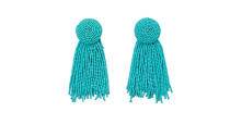 <p>These turquoise dangly earrings are the perfect addition to any summer outfit. <br><a rel="nofollow noopener" href="https://www.zara.com/uk/en/beaded-fringe-earrings-p02673205.html?v1=6454987&gclid=EAIaIQobChMIq66TmeaA3AIVSLTtCh196AUDEAYYASABEgJmnvD_BwE&gclsrc=aw.ds&dclid=CPG1u6TmgNwCFYx00wodsOIDoA" target="_blank" data-ylk="slk:Buy here.;elm:context_link;itc:0;sec:content-canvas" class="link ">Buy here.</a> </p>