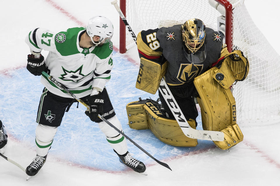 Vegas Golden Knights goalie Marc-Andre Fleury (29) makes a save on Dallas Stars' Alexander Radulov (47) during the second period of Game 1 of an NHL Western Conference final hockey game, Sunday, Sept. 6, 2020 in Edmonton, Alberta. (Jason Franson/The Canadian Press via AP)