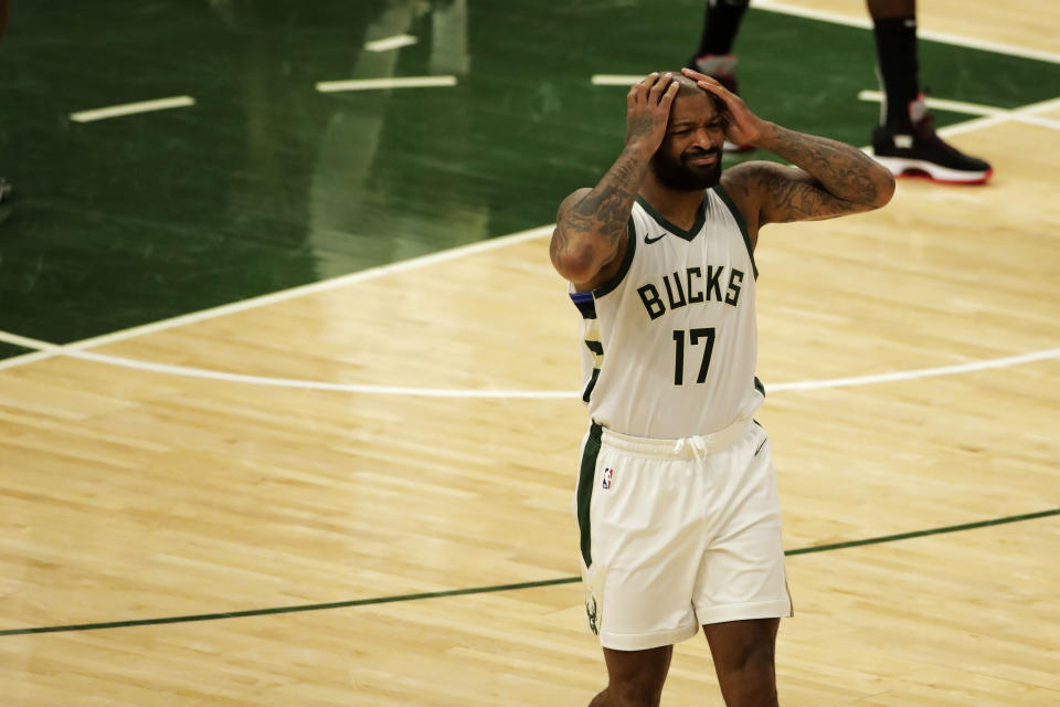 Milwaukee Bucks' P.J. Tucker reacts to a call during the first half of an NBA basketball game against the Brooklyn Nets Tuesday, May 4, 2021, in Milwaukee. (AP Photo/Aaron Gash)