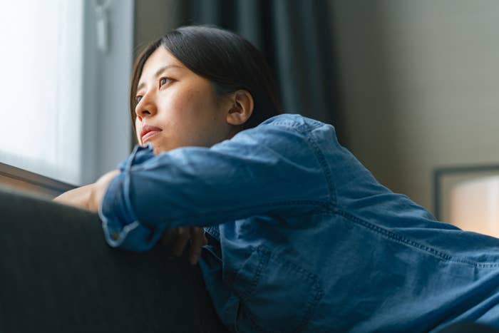 A woman looking out the window