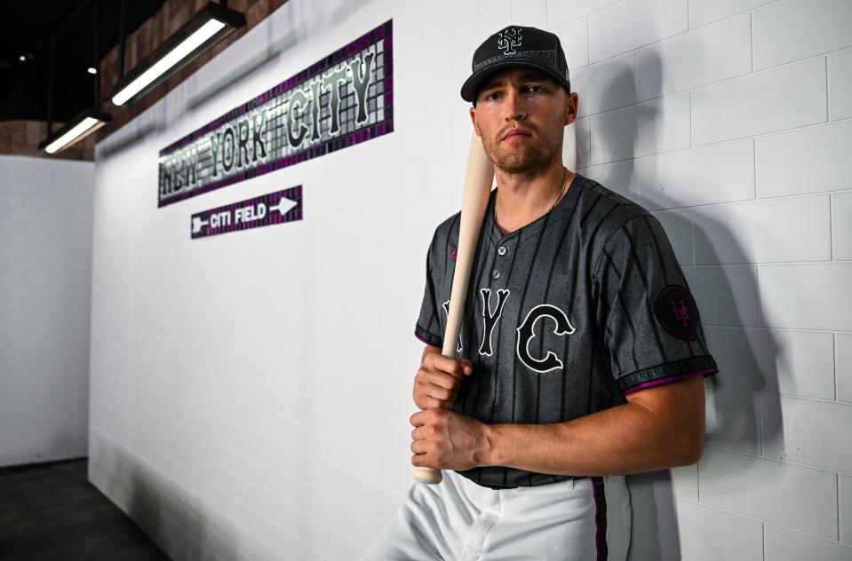 Brandon Nimmo showcases the New York Mets' City Connect uniforms which will be worn during the team's remaining 10 Saturday home games at Citi Field.