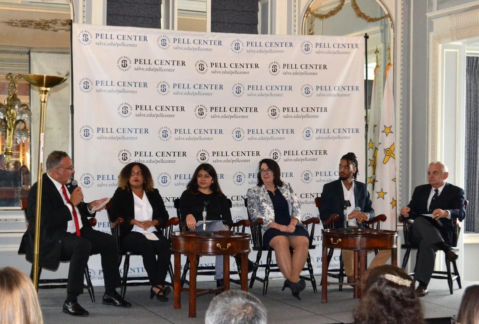 U.S. Secretary of Education Dr. Miguel Cardona, left, leads a panel discussion during a 50th anniversary celebration of the Pell Grant on Monday at Salve Regina University.