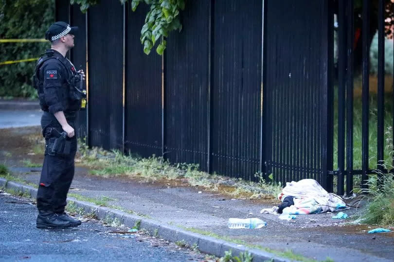 Police at the scene on Busk Road, Chadderton on Wednesday night -Credit:ASP