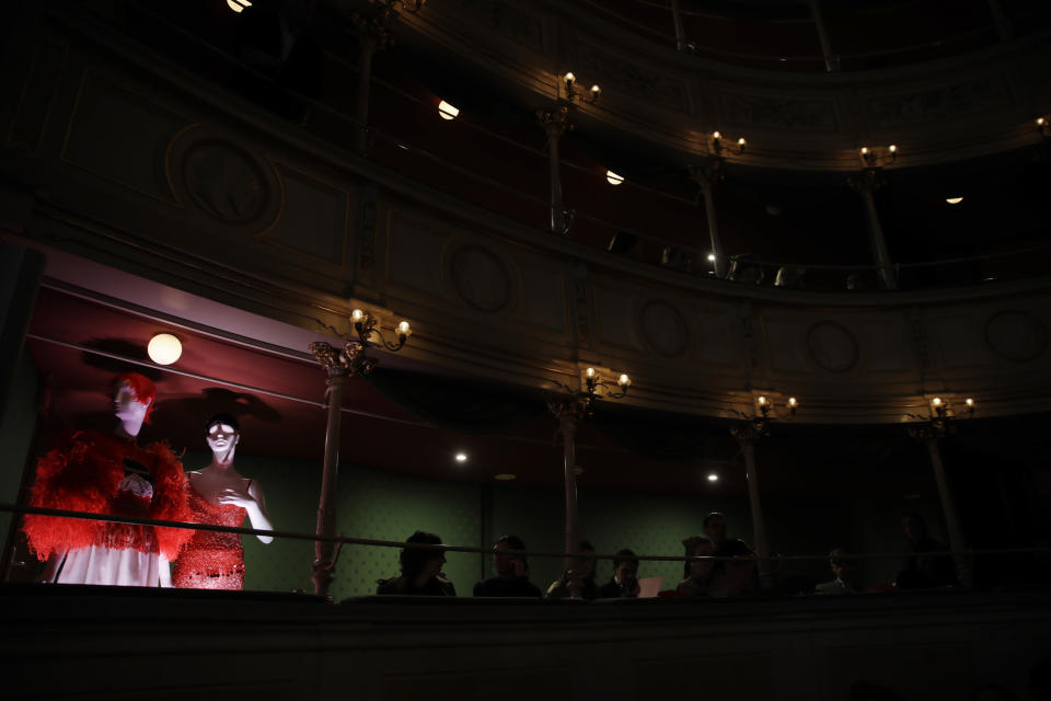 Palomo Spain and Alessandro Michele creations are displayed during the presentation of this year's Costume Institute exhibition titled ''Camp: Notes on Fashion,'' at the Teatro Gerolamo, in Milan, Italy, Friday, Feb. 22, 2019. The exhibition will be shown at the Metropolitan Museum of Art of New York, from May 9-Sept. 8, 2019. (AP Photo/Luca Bruno)