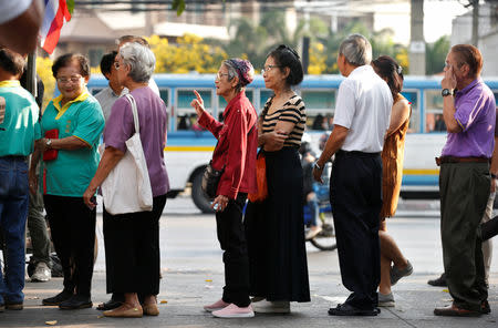 People queue to cast their vote in the general election at a polling station in Bangkok, Thailand, March 24, 2019. REUTERS/Soe Zeya Tun