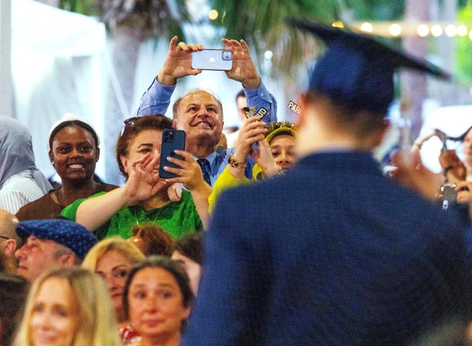 Family celebrate their graduates as they prepare to walk across the stage. Moments from the graduation ceremony for New College Of Florida. They held graduation Friday evening, May 17th, 2024, on the grounds of College Hall.