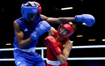 LONDON, ENGLAND - JULY 30: Salomo Ntuve (L) in action with Ilyas Suleimenov of Kazakhstan during their Men's Fly (52kg) Boxing on Day 3 of the London 2012 Olympic Games at ExCeL on July 30, 2012 in London, England. (Photo by Scott Heavey/Getty Images)