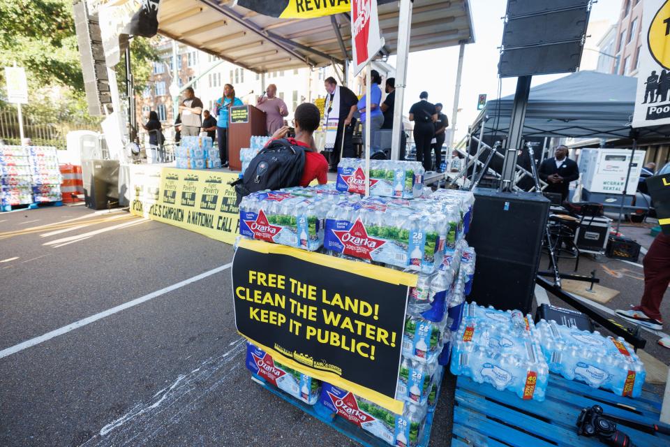 Bottled water is distributed during a Monday afternoon rally on Capitol Street in Jackson, Miss., just outside the Governor’s Mansion Sept. 26, 2022. Sponsored by the Poor People’s Campaign the Moral Monday event was held to draw attention to the city’s ongoing water crisis.