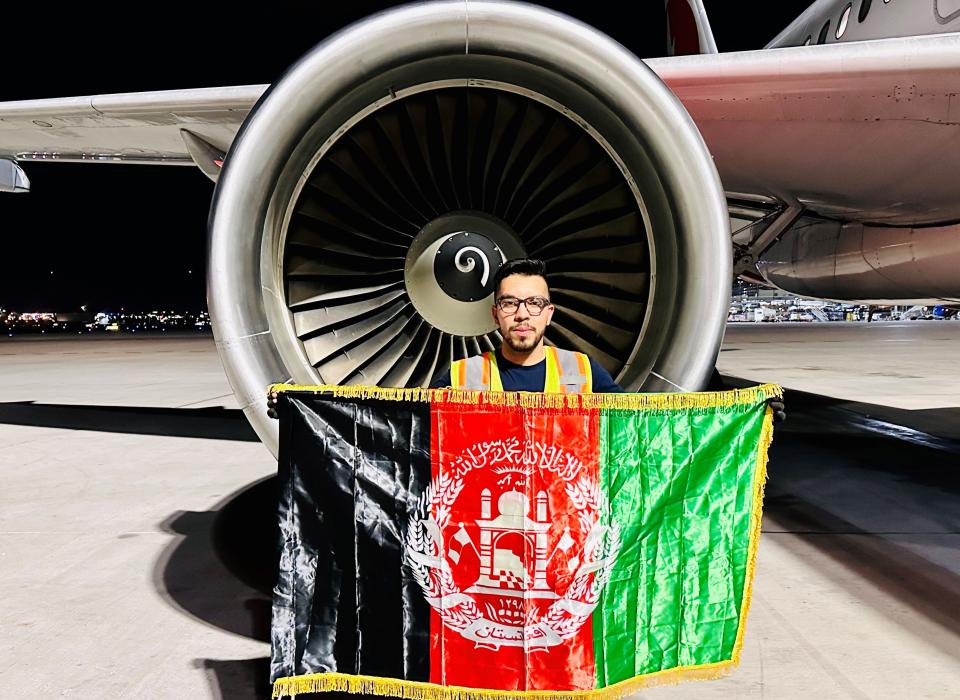 Ahmadullah Noori is an Afghan asylee who fled the country in 2021. As a former fighter pilot, he says he is passionate about flying and now works at Phoenix Sky Harbor Airport.