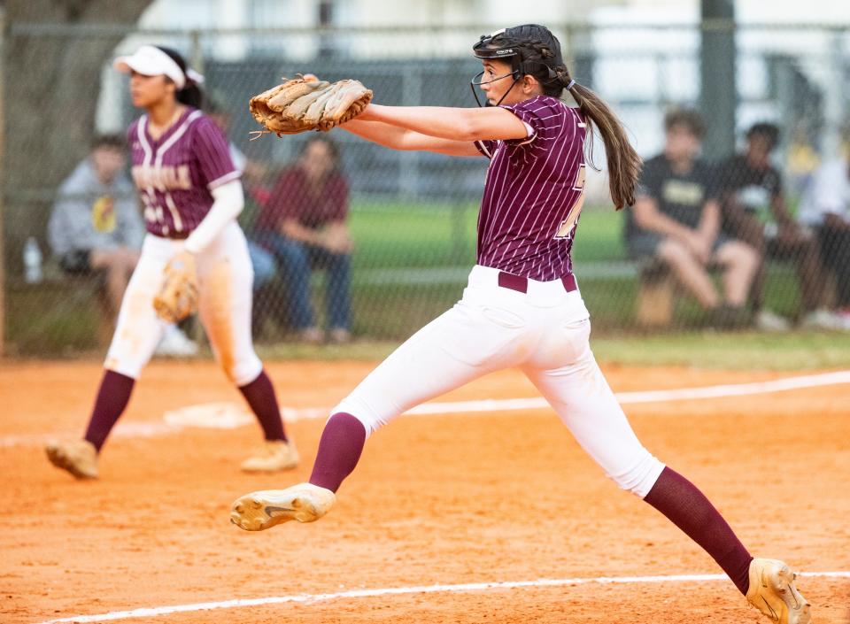 RiverdaleÕs Adrianna Manetta pitches during a 2-1 win in eleven innings over Estero High School at Riverdale High School on Tuesday, March 26, 2024.