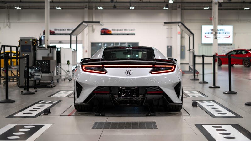An Acura NSX undergoing final checks at the factory
