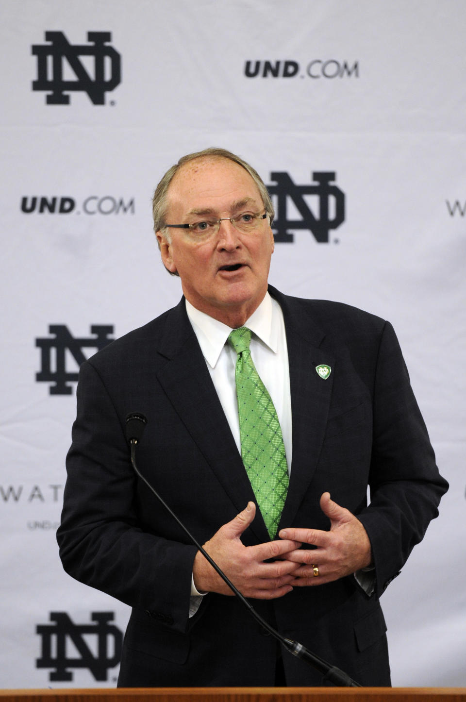 Jack Swarbrick, Notre Dame Vice President and Director of Athletics, speaks during a news conference Tuesday, Jan. 21, 2014, in South Bend, Ind., announcing an agreement between Notre Dame and Under Armour that will outfit the university's athletic teams (AP Photo/Joe Raymond)