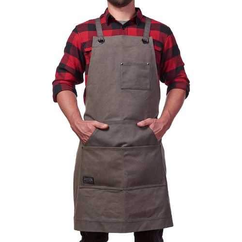 man wearing red flannel with a brown apron on top