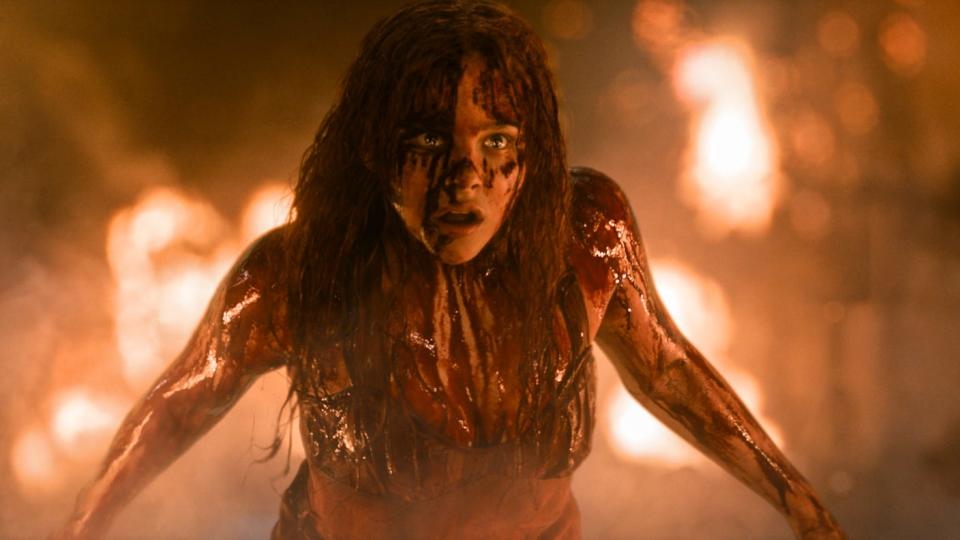 Chloe Grace Moretz as Carrie covered in blood.
