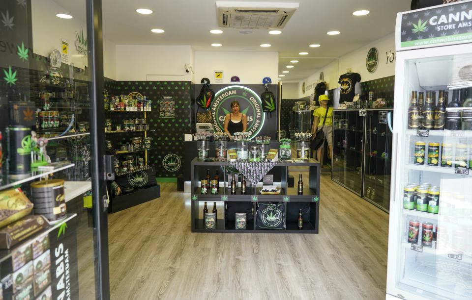 In this Thursday, June 6, 2019 photo shows a cannabis light store in Rome. It’s been called Italy’s ‘’Green Gold Rush,’’ a flourishing business around light marijuana that has created 15,000 jobs and an estimated 150 million euros worth of annual revenues in under three years. But the budding sector is facing a political and judicial buzzkill. (AP Photo/Andrew Medichini)