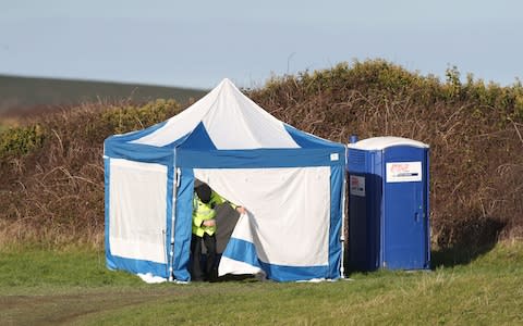 Police activity on a costal path near Swanage, Dorset, as a body was discovered in the hunt for the missing 19-year-old Gaia Pope - Credit: Andrew Matthews/PA