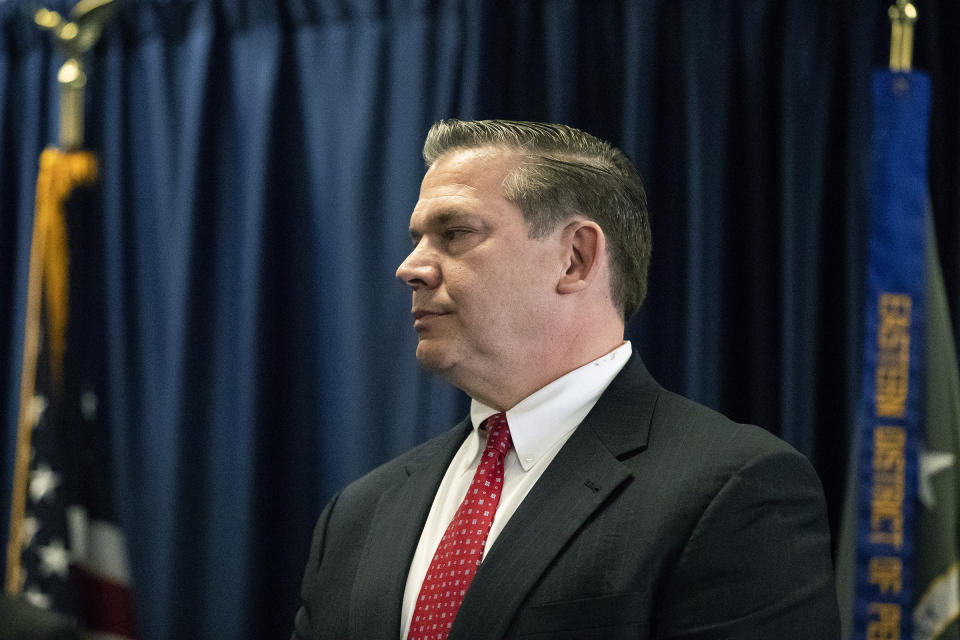 Michael Harpster, FBI special agent of the Philadelphia Division listens during a press conference on the indictment of Local 98 leader John "Johnny Doc" Dougherty at the U.S. Attorney's office in Center City Philadelphia on Wednesday, Jan. 30, 2019. Dougherty, a powerful union boss who has long held a tight grip on construction jobs in the Philadelphia region and wielded political power in the city and Statehouse, was indicted on embezzlement and fraud charges along with a city councilman and six others. (Heather Khalifa/The Philadelphia Inquirer via AP)