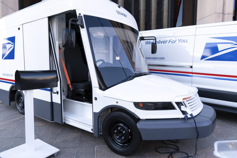 U.S. Postal Service electric vehicles are seen as Postmaster General of the United States of America Louis DeJoy announces the Postal Service will sharply increase the number of electric-powered delivery trucks in its fleet and will go all-electric for new purchases starting in 2026. (AP Photo/Jose Luis Magana)