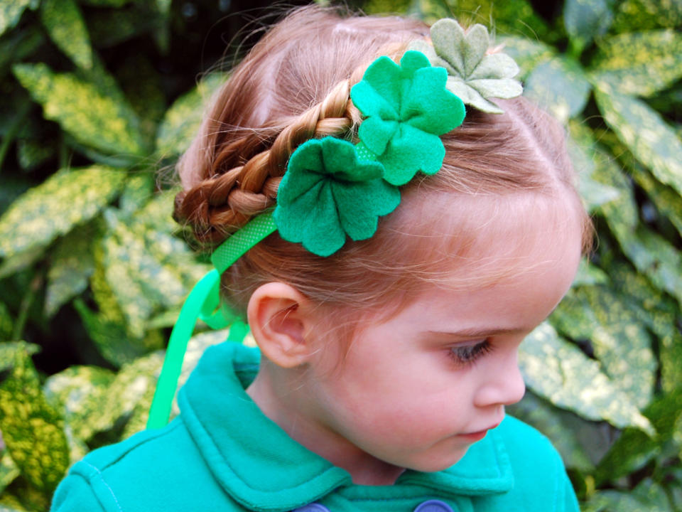 This photo provided by HGTV.com Weekday Crafternoon shows a felt shamrock craft that provides a pretty way to wear some green. “Once you know how to make these shamrocks then when we get to spring you can make them in different colors and have a bouquet of flowers,” says Marianne Canada, host of HGTV.com's Weekday Crafternoon. “It’s a handy little craft to have in your back pocket.” (AP Photo/HGTV.com Weekday Crafternoon, Marianne Canada)