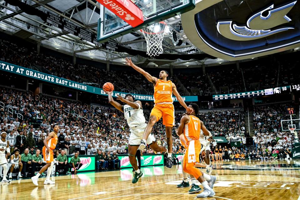 Michigan State's Jeremy Fears Jr., left, shoots as Tennessee's Freddie Dilione V defends during the second half on Sunday, Oct. 29, 2023, at the Breslin Center in East Lansing.