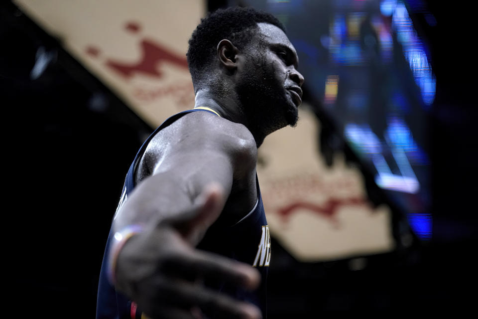 New Orleans Pelicans forward Zion Williamson (1) reacts as he walks to courtside fans to shake hands after being fouled while scoring a basket in the first half of an NBA basketball game against the Detroit Pistons in New Orleans, Wednesday, Dec. 7, 2022. (AP Photo/Gerald Herbert)