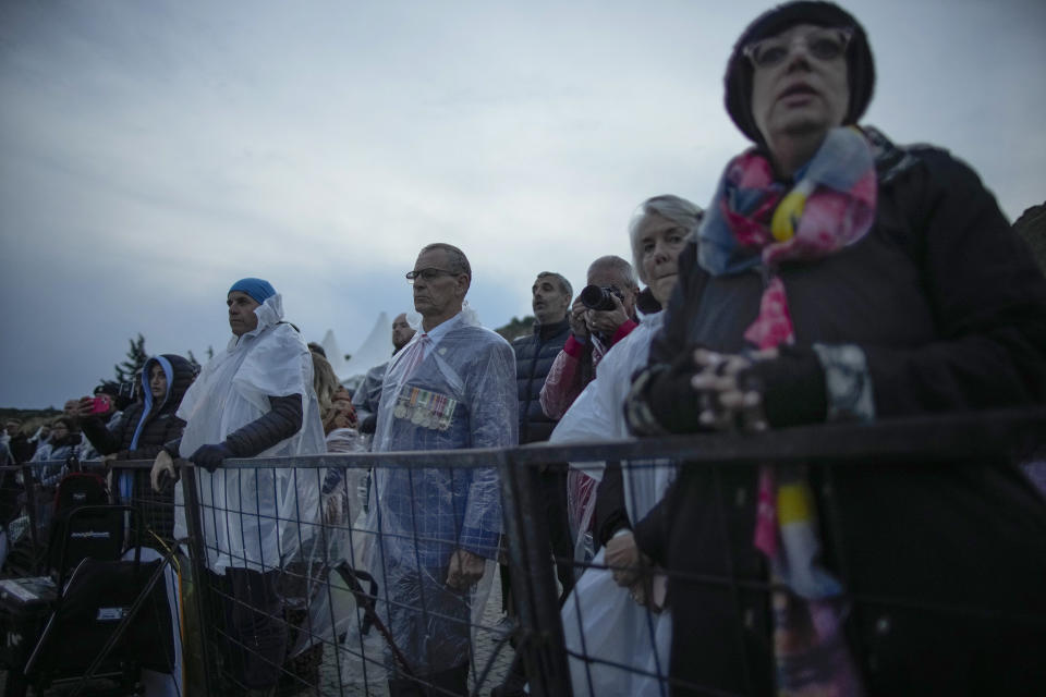 People gather to attend the Dawn Service ceremony at the Anzac Cove beach, the site of the April 25, 1915, World War I landing of the ANZACs (Australian and New Zealand Army Corps) on the Gallipoli peninsula, Turkey, early Tuesday, April 25, 2023. During the 108th Anniversary of Anzac Day, people from Australia and New Zealand joined Turkish and other nations' dignitaries at the former World War I battlefields for a dawn service Tuesday to remember troops that fought during the Gallipoli campaign between British-led forces against the Ottoman Empire army. (AP Photo/Emrah Gurel)