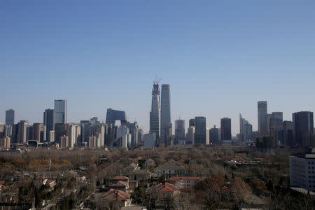 FILE PHOTO: Buildings are seen against blue sky after the wind dispelled dangerously high levels of air pollution in Beijing, China, December 22, 2016. REUTERS/Jason Lee/File Photo