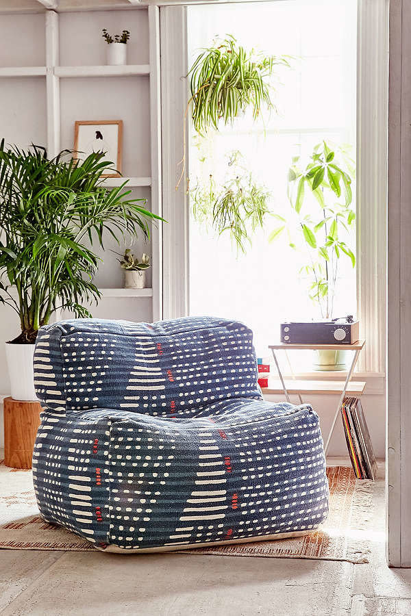 <a href="https://www.urbanoutfitters.com/shop/bobo-patterned-lounge-chair" target="_blank">Shop it here</a>. (PS: it's on sale!)