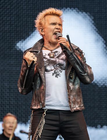<p> Per Ole Hagen/Redferns/Getty Images</p> Billy Idol performs in Oslo in June 2023