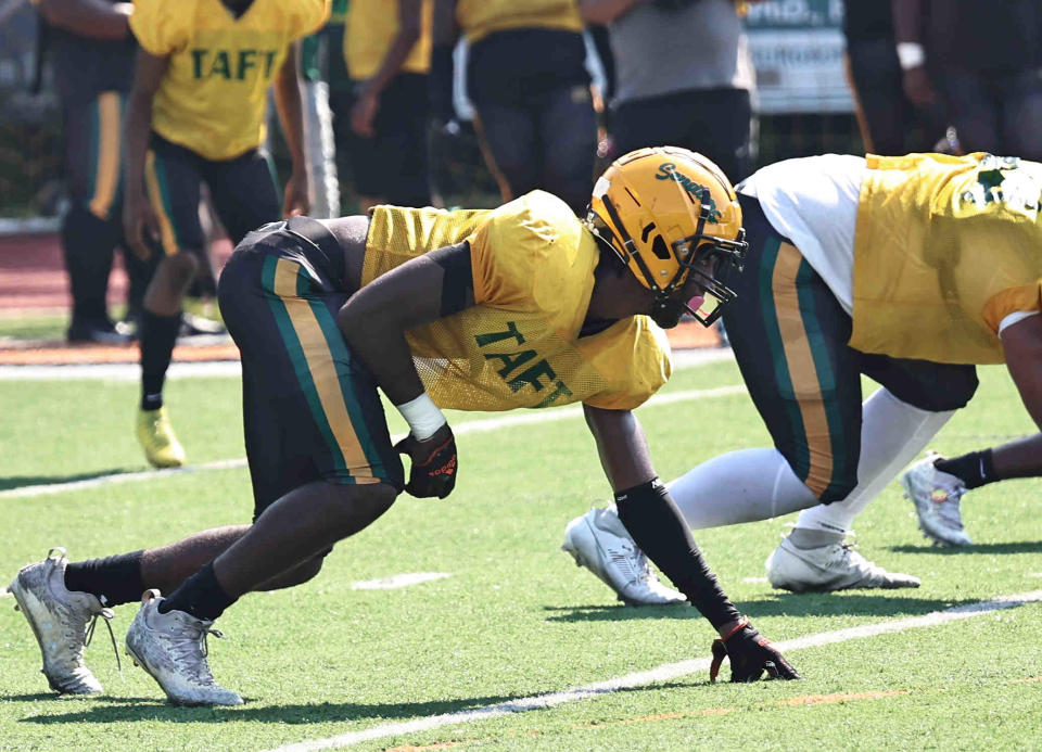 Taft head defensive lineman Elias Rudolph gets set at the line of scrimmage in preseason action Aug. 4 at Anderson