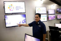 Erick Thohir, President of the Indonesia Asian Games Organising Committee (INASGOC), shows the Game's command centre during an interview with Reuters in Jakarta, Indonesia March 7, 2018. REUTERS/Darren Whiteside