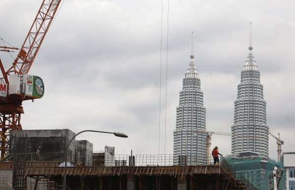 According to Rahim &amp; Co, property transactions in Malaysia fell by 15.8 per cent and 21.6 per cent in volume and value compared to the same period in 2019. — Reuters pic