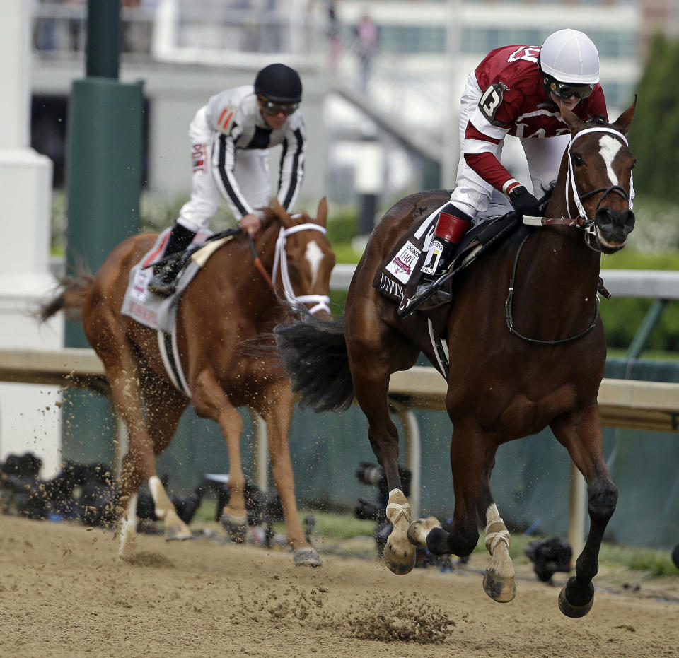Rosie Napravnik rides Untapable to victory during the 140th running of the Kentucky Oaks horse race at Churchill Downs Friday, May 2, 2014, in Louisville, Ky. (AP Photo/David Goldman)