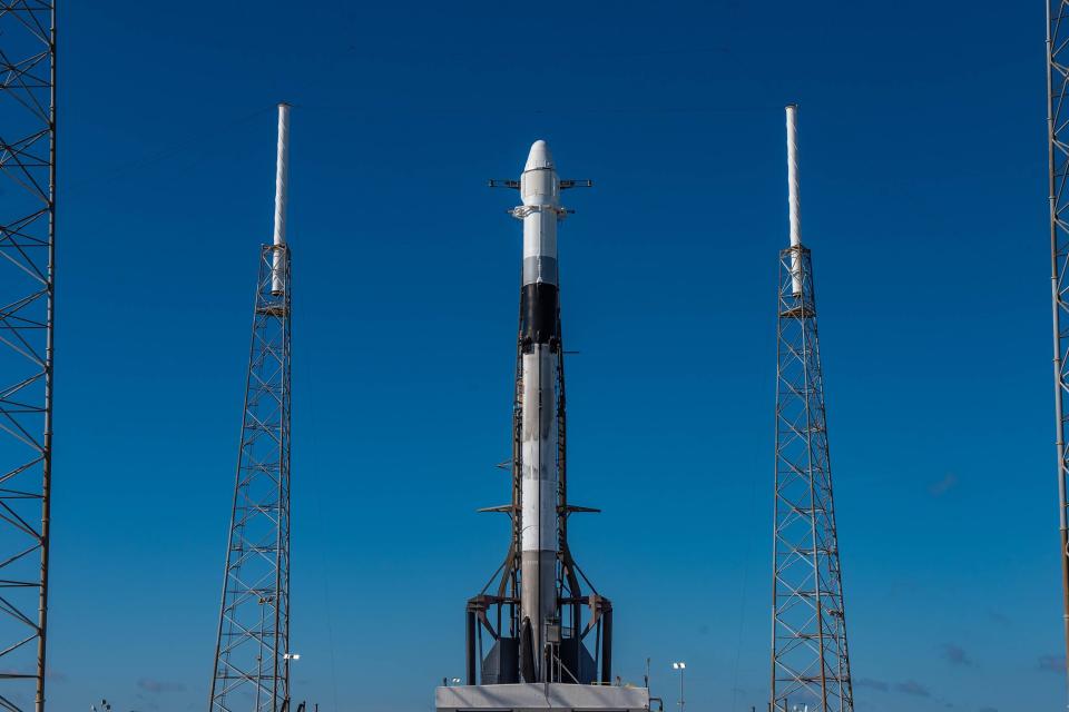 A SpaceX Falcon 9 rocket sits on the pad at Cape Canaveral Air Force Station's Launch Complex 40 on Wednesday, July 24, 2019.