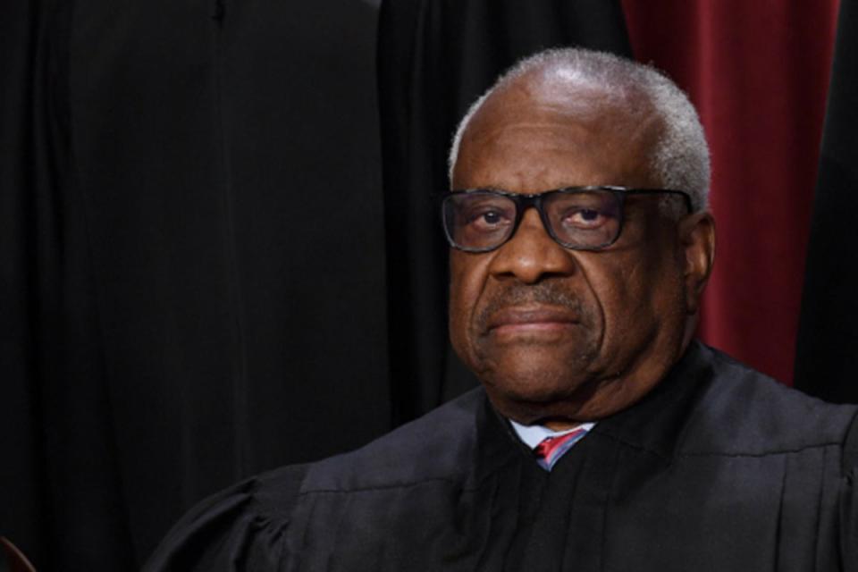 Associate US Supreme Court Justice Clarence Thomas poses for the official photo at the Supreme Court in Washington, DC on October 7, 2022 (AFP via Getty Images)