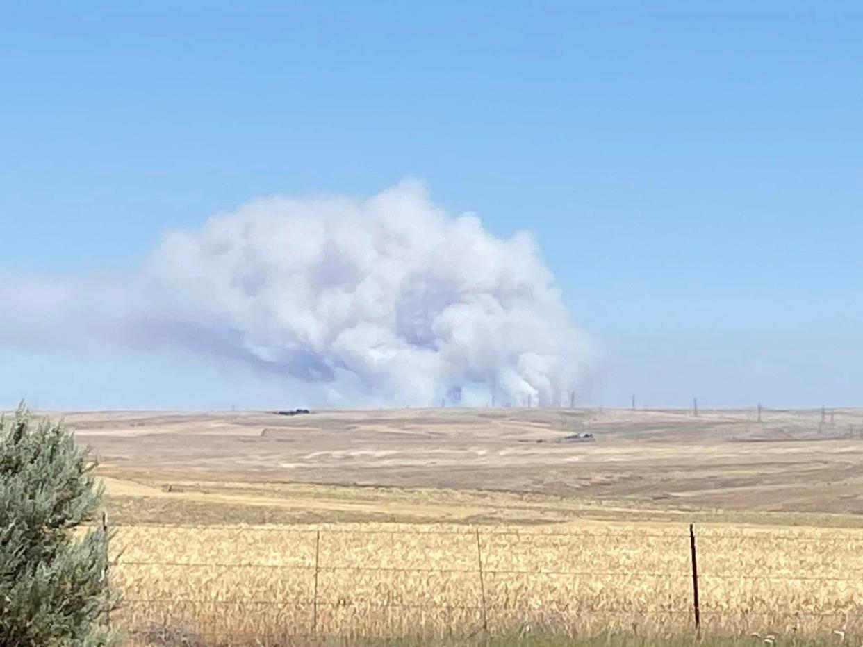 The Devil's Butte Fire grew several hundred acres overnight Tuesday and has now burnt about 3,000 acres. Burning wheatfields and rangeland, the fire has not prompted any evacuation orders.
