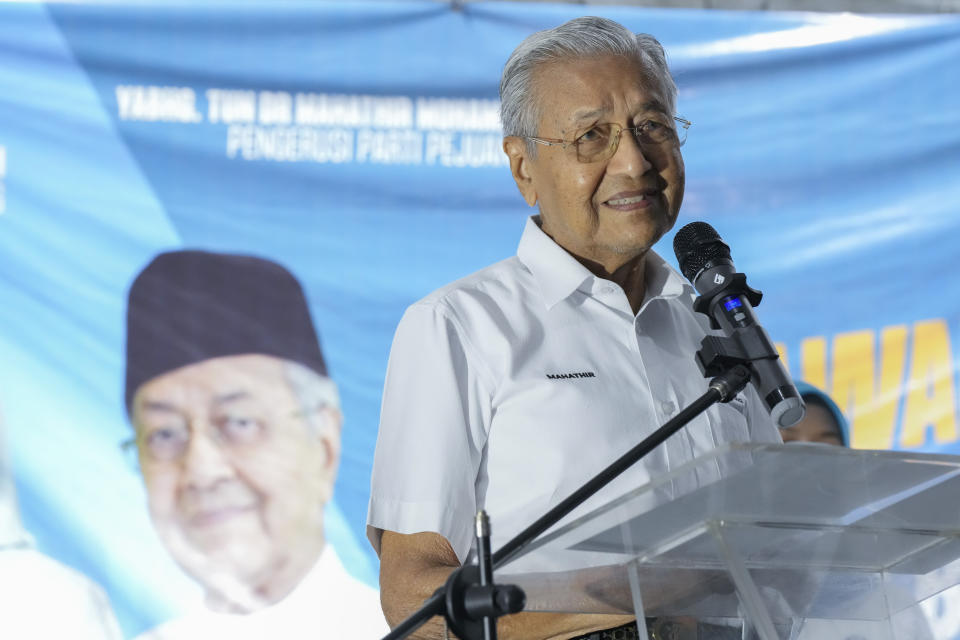 Two-time former Malaysian Prime Minister and Gerakan Tanah Air, or Homeland Movement Chairman Mahathir Mohamad speaks at a rally for his party in Kuala Lumpur, Malaysia, Tuesday, Nov. 15, 2022. At 97, Mahathir is back again in the election race as the head of a new ethnic Malay alliance that he calls a “movement of the people." He hopes his bloc could gain enough seats in Nov. 19 polls to be a powerbroker. (AP Photo/Vincent Thian)