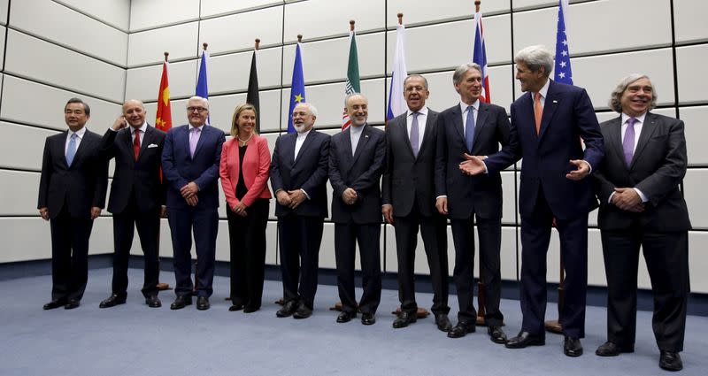 FILE PHOTO: Ministers and officials pose for a group picture at the United Nations building in Vienna