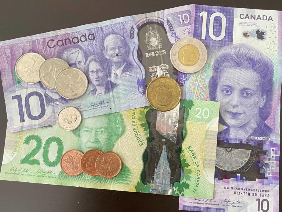 Money 12.7% less buying power on P.E.I. than it did in March 2021. (Kevin Yarr/CBC - image credit)