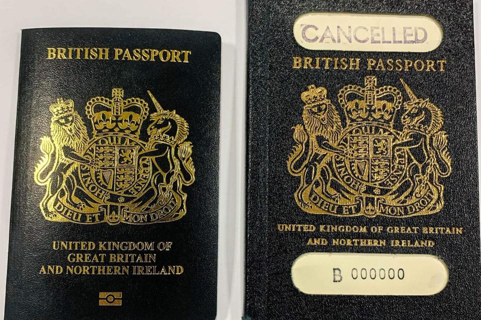 The new and the old UK passports, which were replaced in 1988 by the current burgundy ones (UK HOME OFFICE/AFP via Getty Ima)
