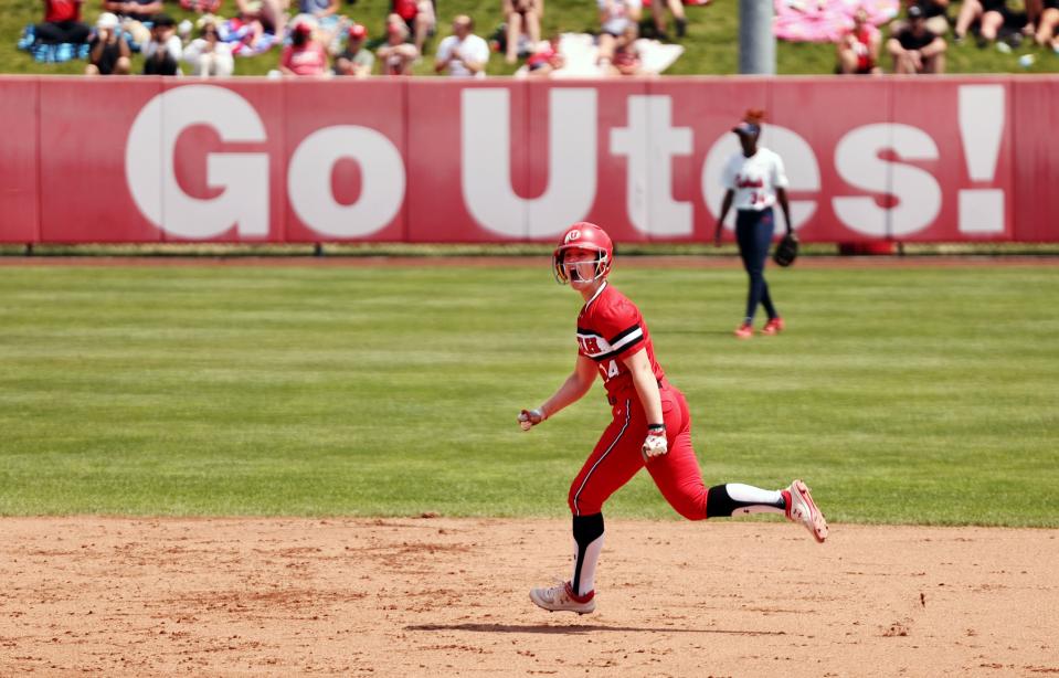 Utah’s Karlie Davison, celebrates hitting a home run as she rounds the bases as the University of Utah softball team plays Ole Miss in NCAA softball regional championship at Utah in Salt Lake City on Sunday, May 21, 2023. Utah won 4-1. | Scott G Winterton, Deseret News