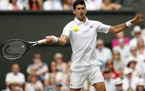 Novak Djokovic of Serbia plays a forehand in his Men's Singles final against Roger Federer of Switzerland during Day thirteen of The Championships - Credit: GETTY IMAGES